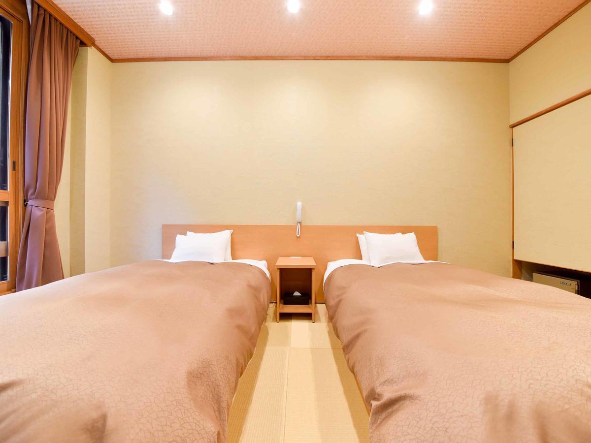 Tsuruya Ryokan มัตสึโมโตะ ภายนอก รูปภาพ